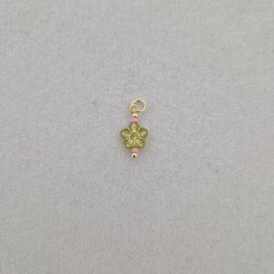 Bedel met groene bloem