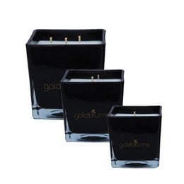 Vegan scented candle cubes in gold, black, and bronze colors. Cube-shaped candles with a clean, minimalist design.