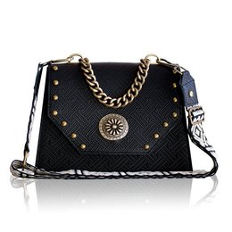 Black textured leather shoulder bag with gold-tone chain strap, stud detailing, and circular metal embellishment.