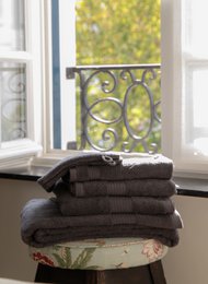  Soft, absorbent hand towel in various neutral colors, measuring 50x100 cm.