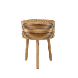  Wooden side table with round woven top and three wooden legs, suitable for storage and display.