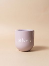  A light purple ceramic mug with the text "aj lovju" printed on it.