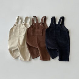 Corduroy baby dungarees in cream, brown, and navy colors. Available in sizes 3-6M, 6-12M, 12-18M, 18-24M, and 2-3Y.