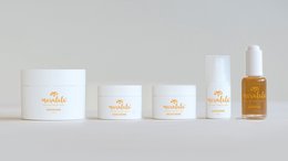 A set of cream-colored skincare products by the brand Marulala, including a jar, a bottle, and a dropper bottle. The products appear to be made with natural ingredients and have a minimalist, high-quality design.