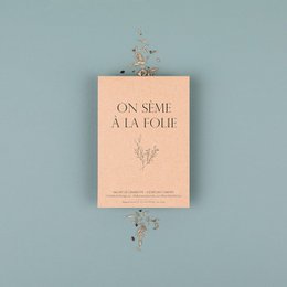 A pink card with the text "On seme a la folie" (We sow madly) and floral illustrations. The card is part of a set of love-themed cards.