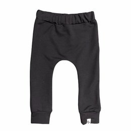Black baggy terry pants for newborns. Made of soft, comfortable terry fabric. Available in sizes 44, 50, 56, 62, and 68.