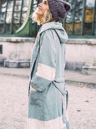Contemporary 100% cotton unisex bathrobes in a variety of colors including black, petrol, mustard, bordo, grey, light grey, beige, olivine green, navy blue, turquoise, orange, pink, and soft pink. Available in sizes small, medium, large, and XL.