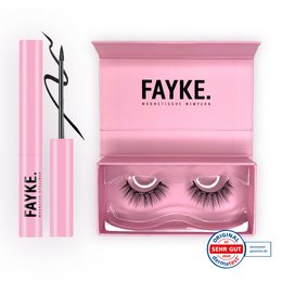 A pink and black makeup kit containing false eyelashes and a pink applicator wand.