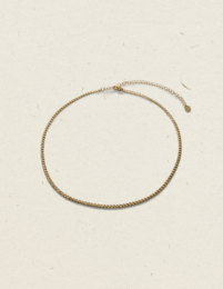 Gold-toned charm bracelet with a delicate chain design.