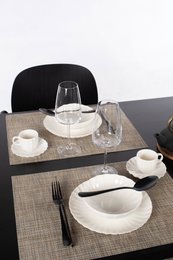  "Rectangular woven placemat, neutral beige tan color, textured fabric, modern minimalist dining table setting"