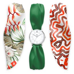 A stylish, modern watch with a white dial and a green, red, and white patterned strap.