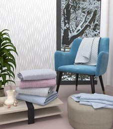 Soft, cozy chenille throws in a variety of colors including grey, pink, skyblue, and green. Each throw measures 130 X 180 cms, providing ample coverage for relaxing or decorating.