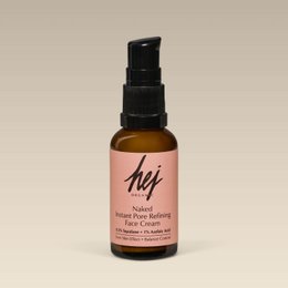 Instant Pore Refining Face Cream 30ml, a cream product in a glass bottle with a black pump dispenser. The cream is a light peach color. The bottle has the brand name "Hy" printed on it.