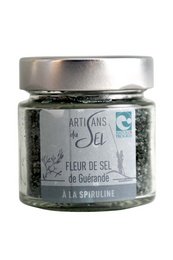 Guérande salt flower with spirulina, a seasoning product. The salt has a distinctive green color due to the addition of spirulina, a type of blue-green algae. This salt can be used to add flavor and nutritional benefits to various dishes.