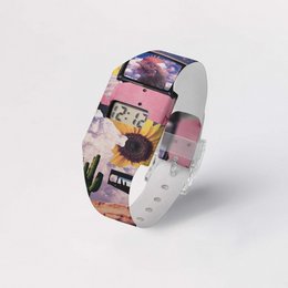 Colorful digital wristwatch made of Tyvek® material, featuring a playful, abstract design with various shapes and patterns.