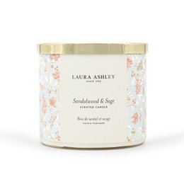 Scented candle with sandalwood and sage fragrance, presented in a decorative glass container with a floral pattern. The candle is part of the Laura Ashley home collection.