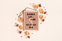 White wall art with text "Dance Like No One Is Watching" and decorative elements like leaves and flowers. Available in A4 and A3 sizes.