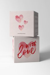 A white gift box with a pink heart design and the text "WITH LOVE" written in red. The box appears to be a decorative gift item, likely for a romantic occasion or to express affection.