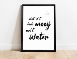 A black and white poster featuring the Low German phrase "Wat is t but mooij an t Water" (What is it but beautiful at the Water) in a typographic design. The poster has a minimalist, monochrome aesthetic and would be suitable for home or office decor.