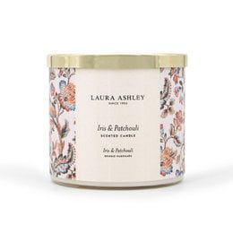 Iris & Patchouli scented candle by Laura Ashley, 400g. Features a floral fragrance with notes of iris and patchouli. Comes in a decorative glass container with a floral design.