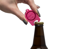 Pink festival cap with bottle opener. Versatile accessory for outdoor events and parties.