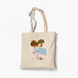 Organic cotton tote bag with a colorful illustration of a summer landscape featuring trees, flowers, and a person walking.