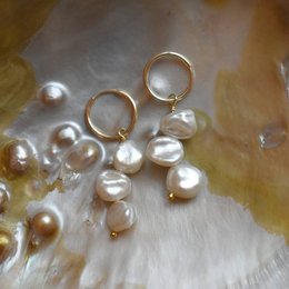 Elegant pearl earrings with a classic design, perfect for any occasion.