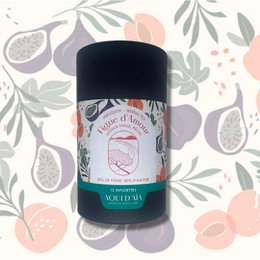 Organic tea infusion in a decorative tin container with floral design. Includes details about the product's color, material, and style.
