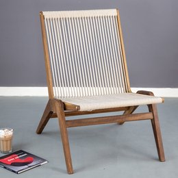 Smoked oak and beige chair with a minimalist, modern design. Features a wooden frame and woven seat for a comfortable and stylish seating option.