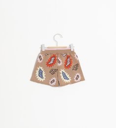 Beige kids shorts with colorful butterfly and leaf print. Made of lightweight, breathable fabric. Suitable for ages 2-10 years.