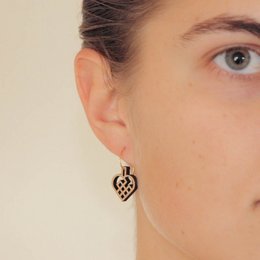 Heart-shaped hoop earrings in silver or gold-plated silver with a Celtic knot design.