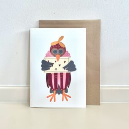 A colorful, whimsical illustration of a lovebird on a red love card.