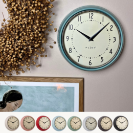 Retro wall clock in cream, rose, red, ice, leaf, white, almost black, and black colors. Features a classic round shape and analog display.