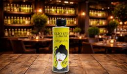  Lemon-infused olive oil in a bottle with a stylized female illustration on the label. The product is part of the "Olio Evo Limone" line.