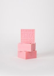 Rose-scented soap bar, 125g. Rectangular pink soap with embossed text.