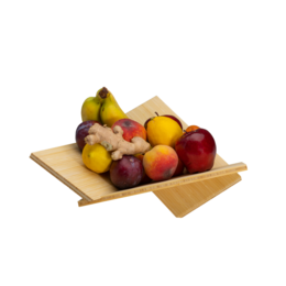 Sustainable bamboo fruit bowl with assorted fresh fruits including apples, pears, grapes, and strawberries.