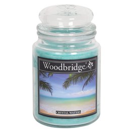Scented candle with a fresh, clean fragrance of Crystal Waters. The candle is tall and round in shape, made of glass with a clear lid. The label features a tropical beach scene with palm trees.