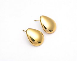  Gold teardrop stud earrings, polished shiny finish, classic elegant jewelry, smooth curved shape