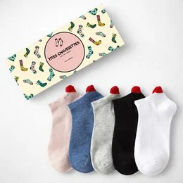 Five-pack of black and white socks with red heart design.