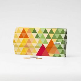 A large, colorful wallet made of Tyvek cardboard with a geometric triangle pattern in shades of yellow, green, and red.