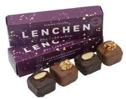 Gourmet chocolate gift box containing 4 pieces of gingerbread-flavored chocolate truffles.