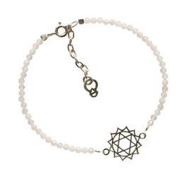 Silver-toned charm bracelet with white beads and a heart chakra charm.