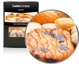 Assorted savory baked goods including flaky pastries, rolls, and bread slices in a variety of colors and textures.