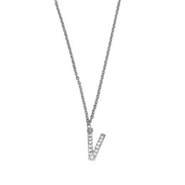 Silver-toned diamond-encrusted necklace with a 'V' pendant.