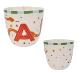  A ceramic coffee cup with a whimsical design featuring the letter A, stars, and other decorative elements. The cup is part of the Grown - Latter Cup A - AromaTherapie - Balance DoTerra - Essential oil - Survey - Latter heads - soy wax - coffee cups - valents gift collection and is categorized as a Scented Candle.