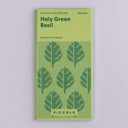 Green leafy basil plant with vibrant green leaves.