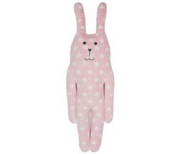 Soft, plush pink rabbit plushie with a smiling face and polka dot pattern. Ideal for cuddling and decorative purposes.