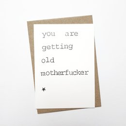 Humorous birthday card with text "you are getting old motherfucker"