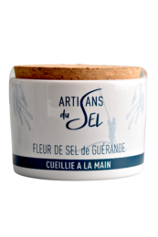 Natural ceramic pot containing Fleur de Sel de Guérande, a premium sea salt harvested by hand in Guérande, France. The pot features a simple, rustic design with a cork lid.