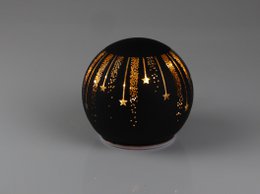 Black glass ball with gold star pattern, suitable for Christmas lighting.